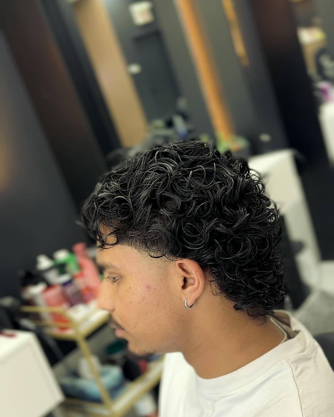 Curly top with taper by Nedved Cruz